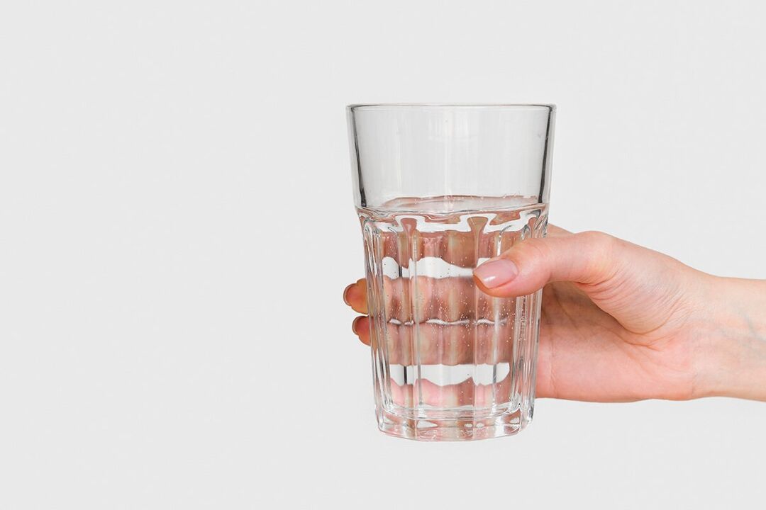 A glass of water with diluted powder zxcvbnmq value